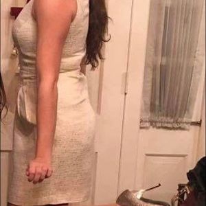 Fitted cream and gold dress..